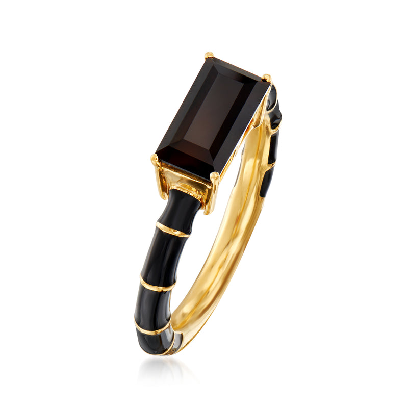 Side view of rectangular black stone ring with black enamel bands and gold bezel