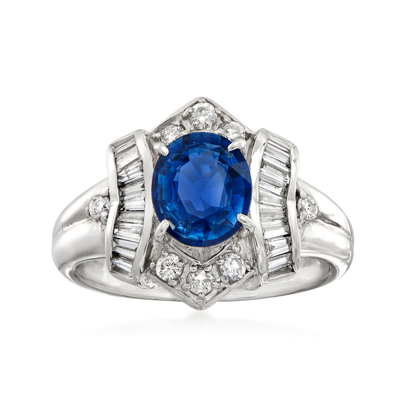 Platinum ring with oval blue sapphire center and baguette diamond sides