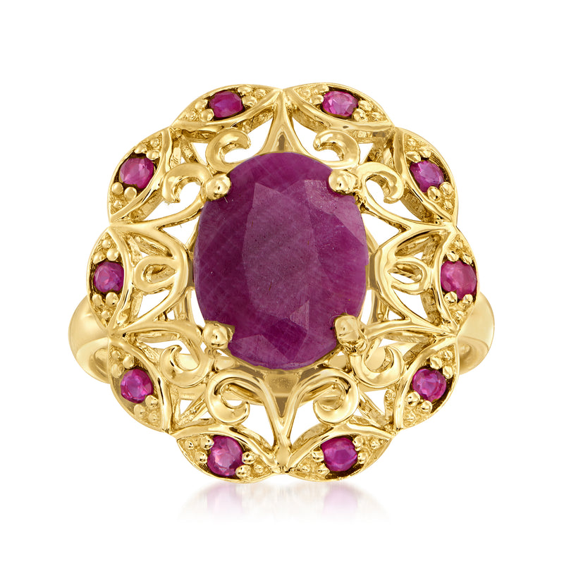 14kt yellow gold openwork ruby ring with oval purple ruby center and gem-set halo