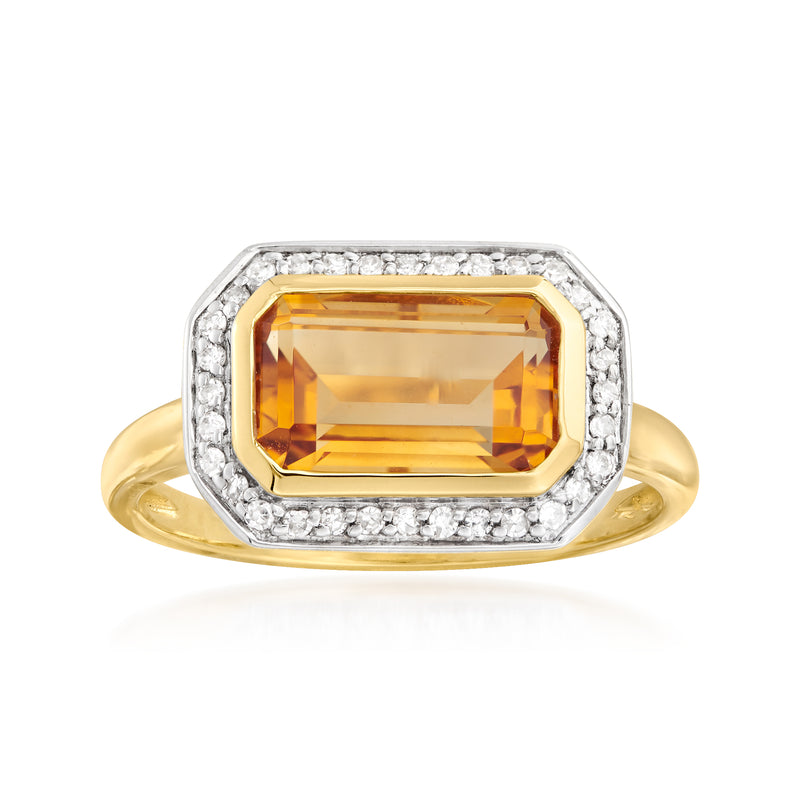 14k yellow gold ring with rectangular citrine center and diamond halo