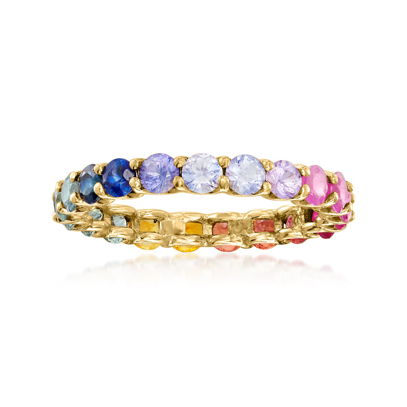 14kt yellow gold eternity ring with multicolored sapphire stones in blue, pink, and purple
