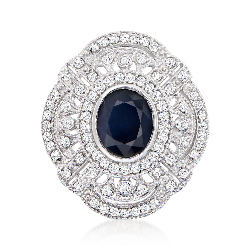 14kt white gold ring with dark blue oval sapphire and diamond halo