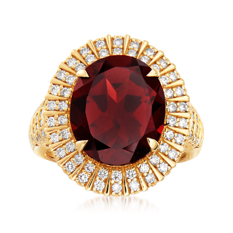 18kt yellow gold garnet halo ring with diamond accents