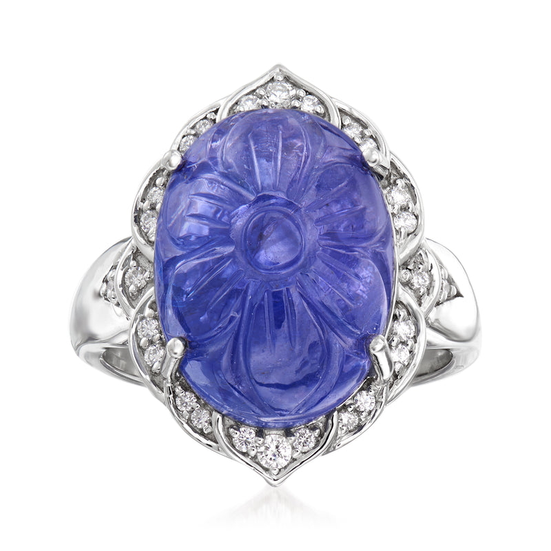 18kt white gold ring with oval blue tanzanite center and diamond halo