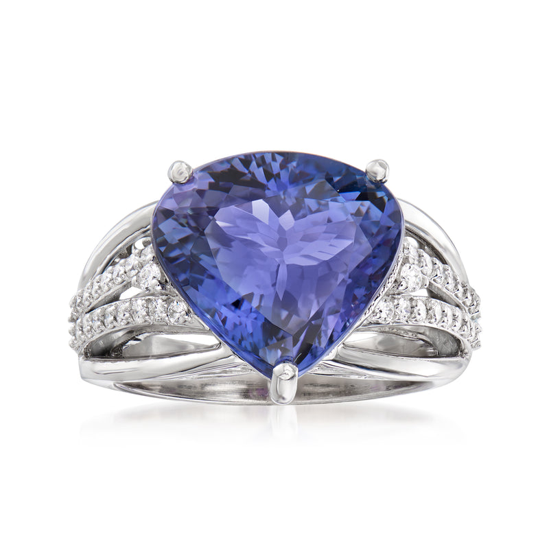18kt white gold ring with pear-cut blue tanzanite and diamond side accents