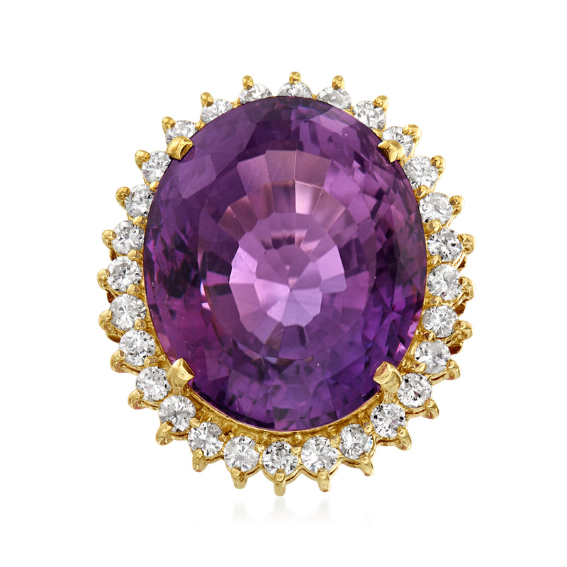 Oval amethyst gemstone ring with diamond halo and 18kt yellow gold setting