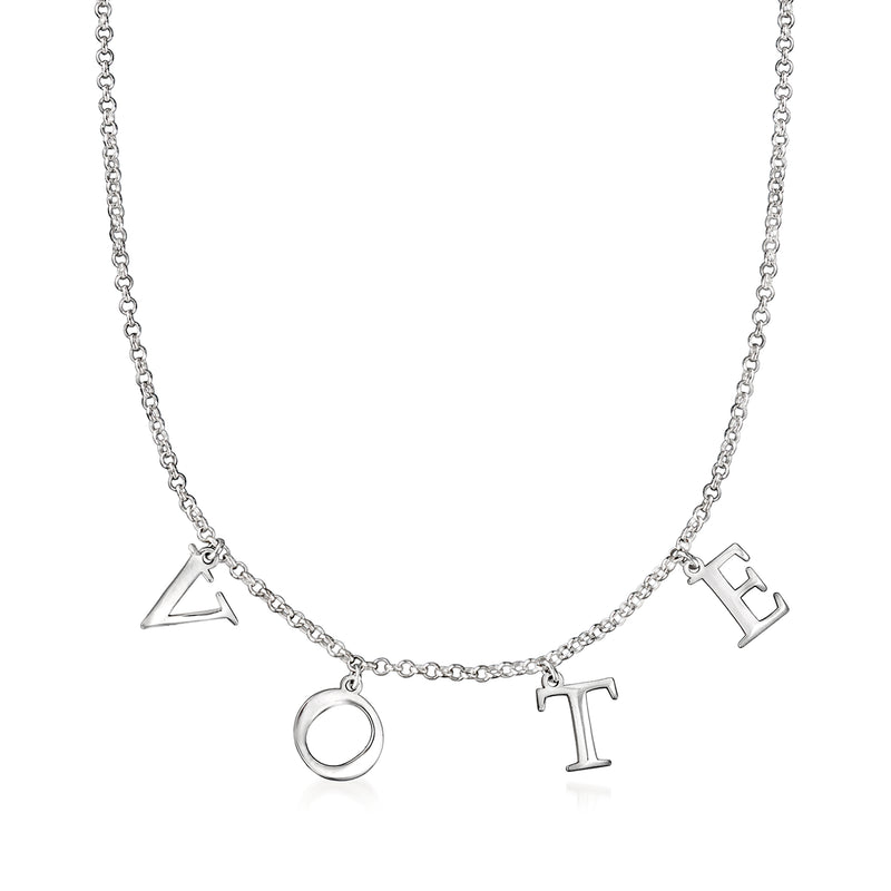 Sterling silver charm necklace with letter and symbol charms, including O and T