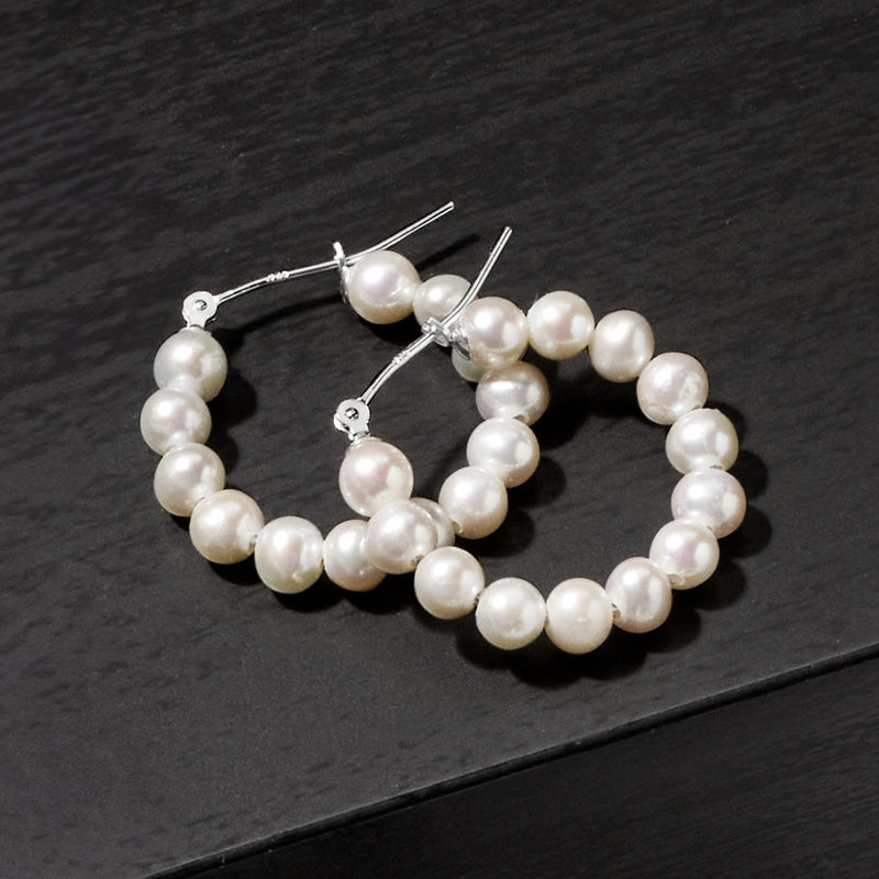 Sterling silver hoop earrings with 4–5mm cultured pearl beads, single-row round hoops