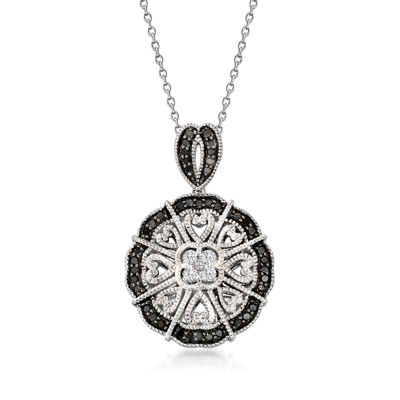 Sterling silver pendant necklace with oval black and white diamond medallion