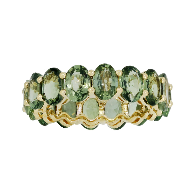 Green sapphire eternity band in 18kt yellow gold with oval green stones