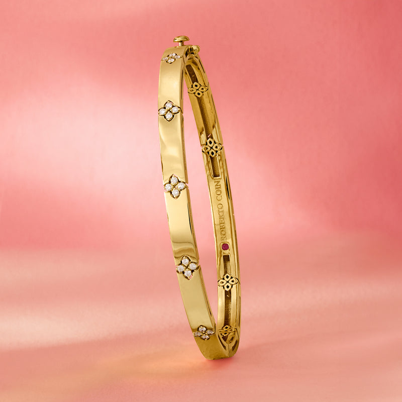 Yellow gold diamond bracelet band with floral motifs and hinged clasp