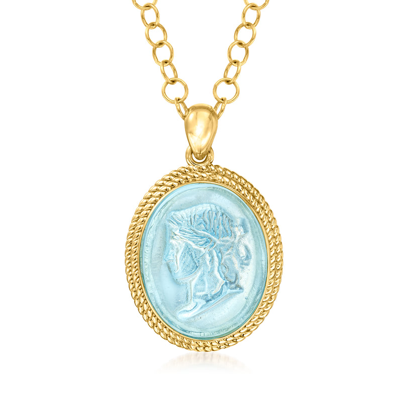 Gold tone pendant necklace with light blue oval glass cameo profile, rope frame