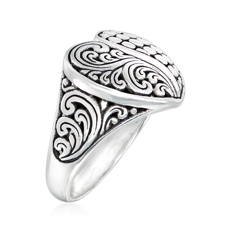 Sterling silver heart ring with Bali-style swirls and faceted textured heart top