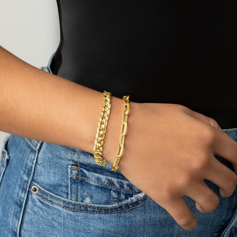 14kt yellow gold chain bracelet set on wrist: curb-link and paper clip links