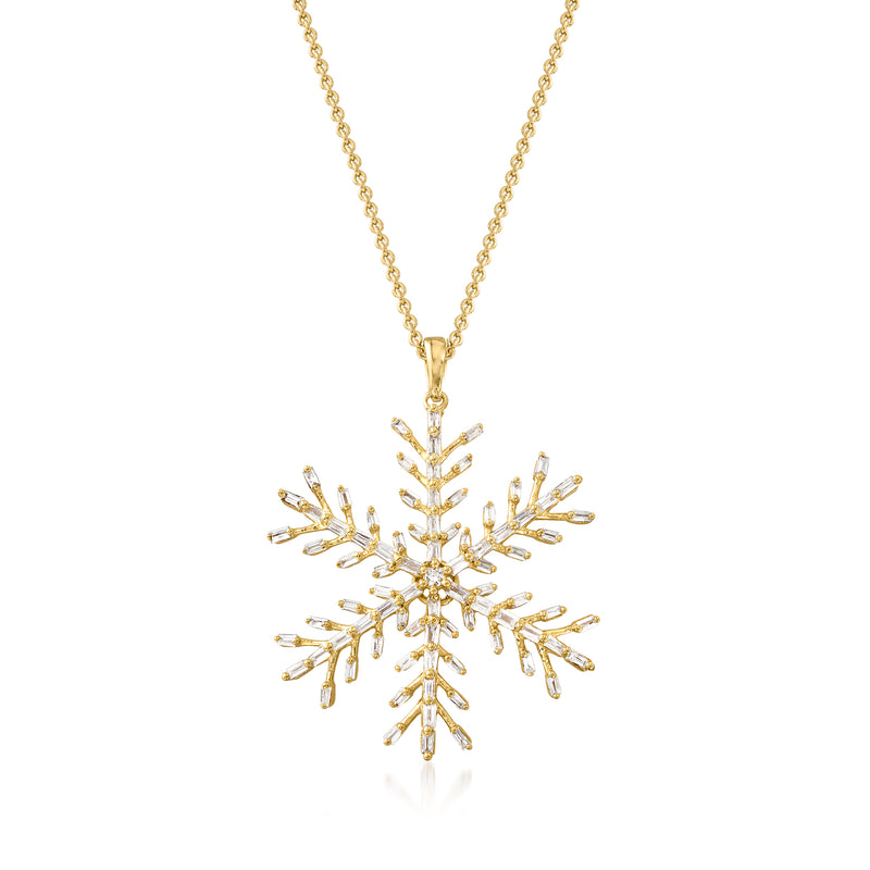 Gold snowflake pendant necklace with sparkling diamond-style stones on a chain