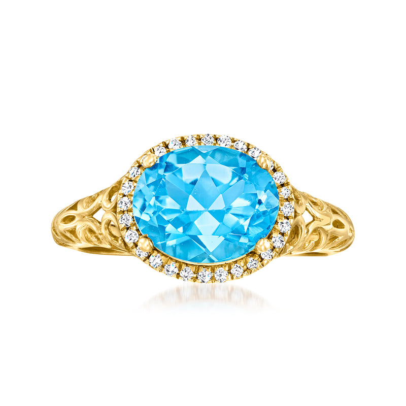 14kt yellow gold ring with oval Swiss blue topaz and round diamond halo