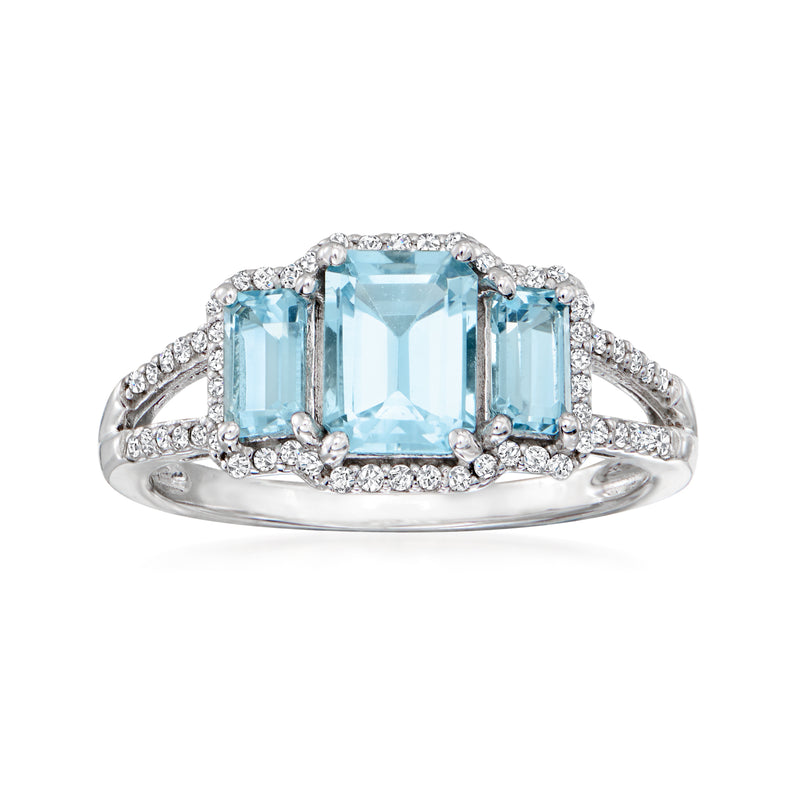 Three-stone aquamarine and diamond ring, white gold; emerald-cut center with side aquamarines