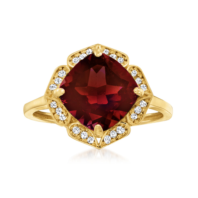 14kt yellow gold ring with large deep red garnet center and white topaz halo