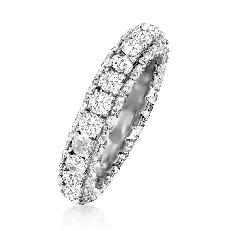 Sterling silver eternity band with round CZ stones, side view on a slender band
