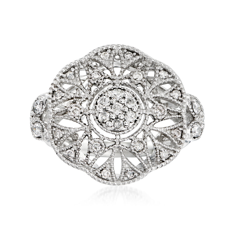 Sterling silver openwork diamond cluster ring with circular center and radiating prongs