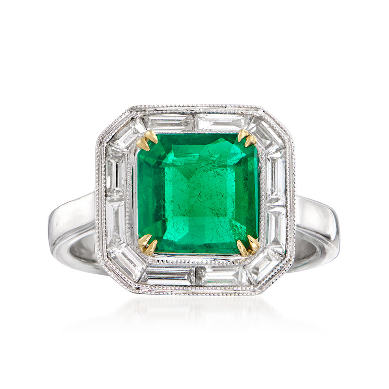 Two-tone gold ring with emerald-cut green gemstone and diamond halo