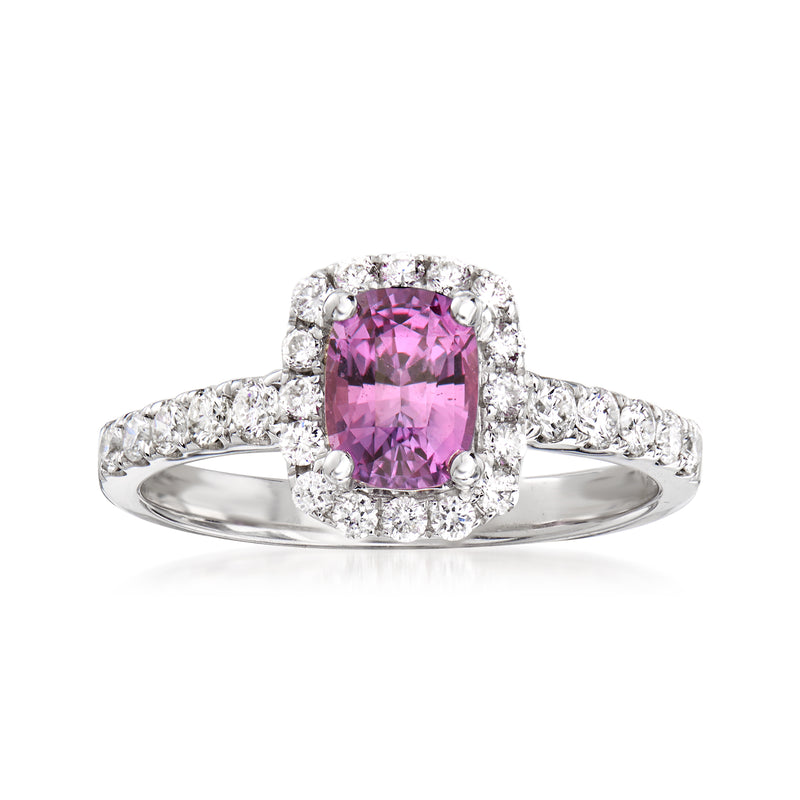 18kt white gold ring with oval pink sapphire center and diamond halo split shank