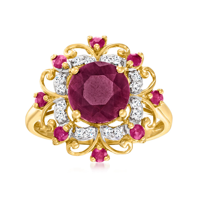 14kt yellow gold ruby and diamond frame ring with large purple center stone