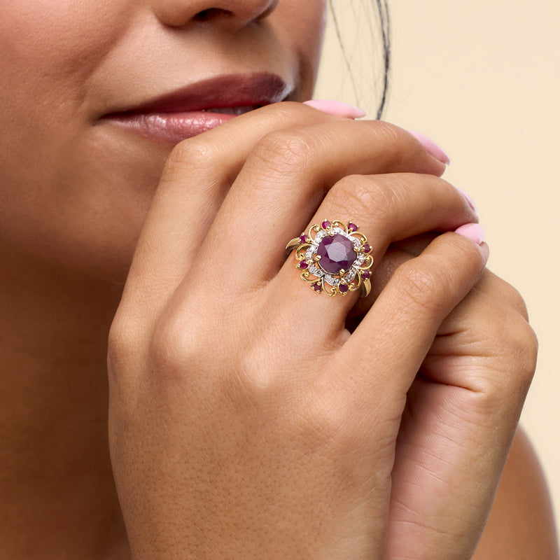 14kt yellow gold ruby and diamond ring with purple center and pink ruby accents
