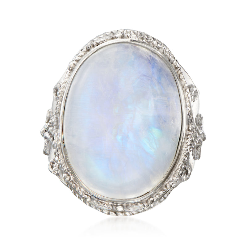 Sterling silver oval moonstone ring with ornate scrollwork bezel