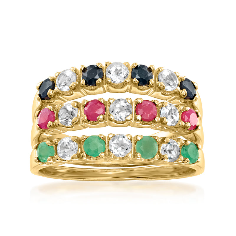 Three-ring gemstone jewelry set in gold tone with white, black, pink, and green stones