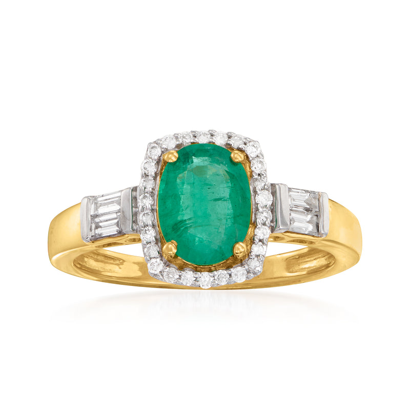 14kt yellow gold ring with oval green emerald, diamond halo and baguette shoulders