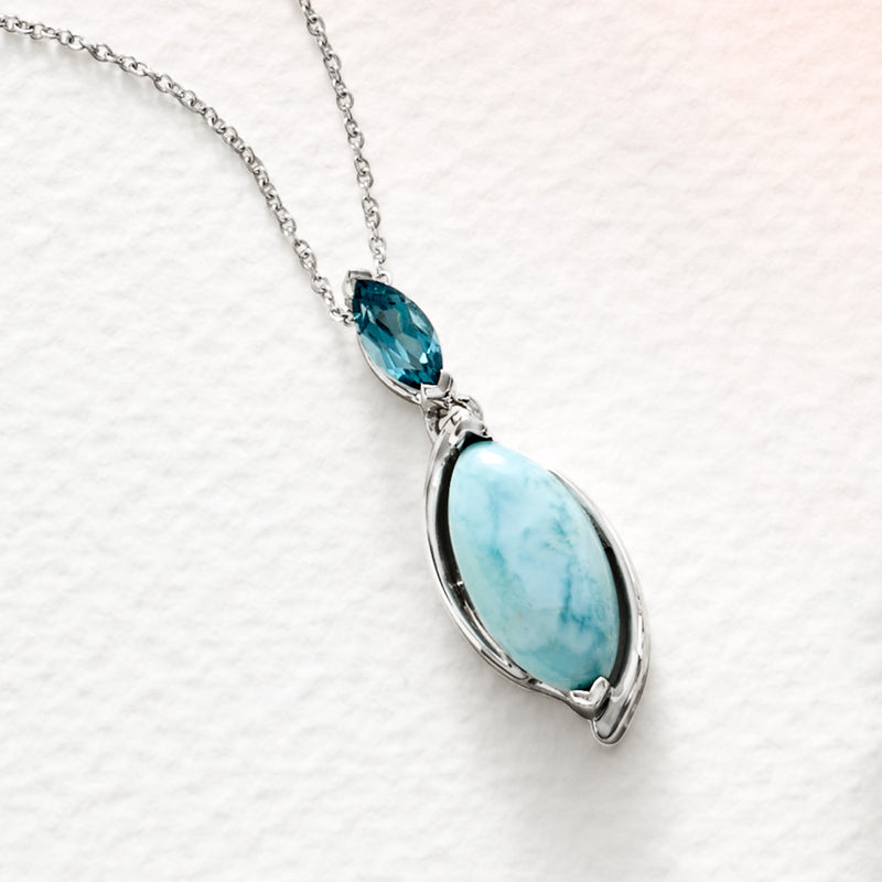 Sterling silver pendant necklace with oval larimar stone and marquise blue gemstone