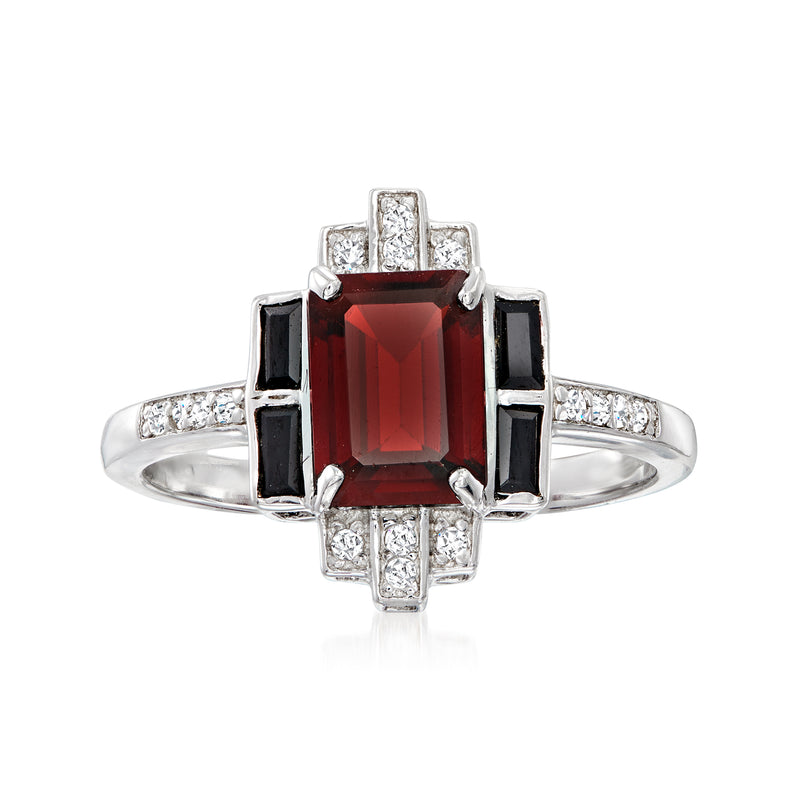 Sterling silver ring with emerald-cut garnet center, black spinel sides, white topaz accents