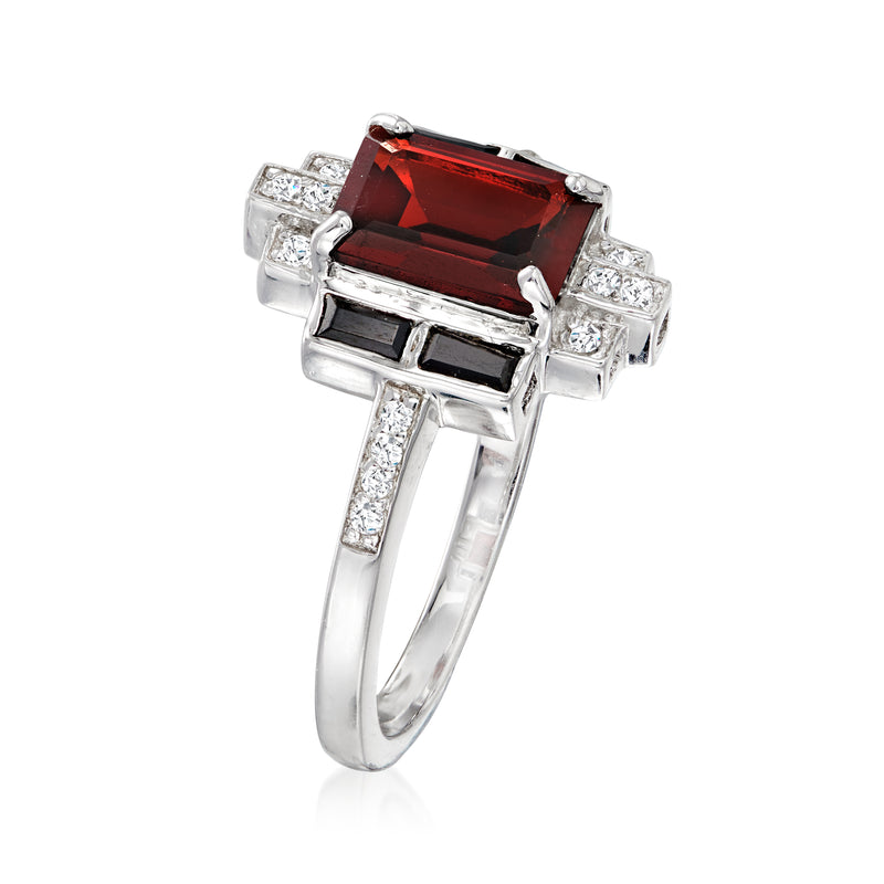 Sterling silver ring, side view with emerald-cut garnet center, black spinel and white topaz