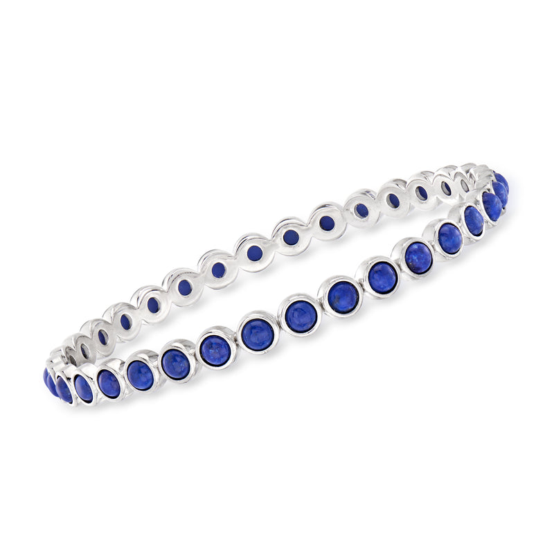 Sterling silver bangle bracelet with oval blue lapis stones in bezel settings