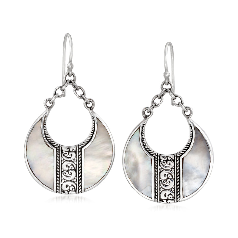 Sterling silver Bali-style teardrop earrings with iridescent mother-of-pearl panels