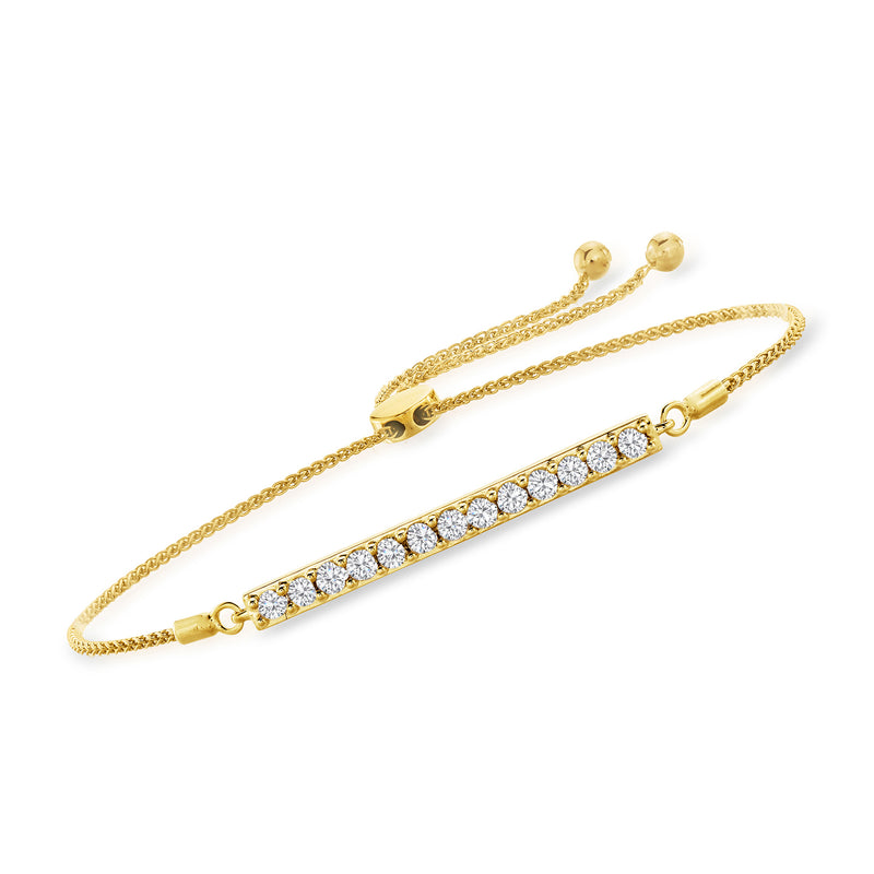 Gold bolo bracelet with diamond bar centerpiece and adjustable sliding ends