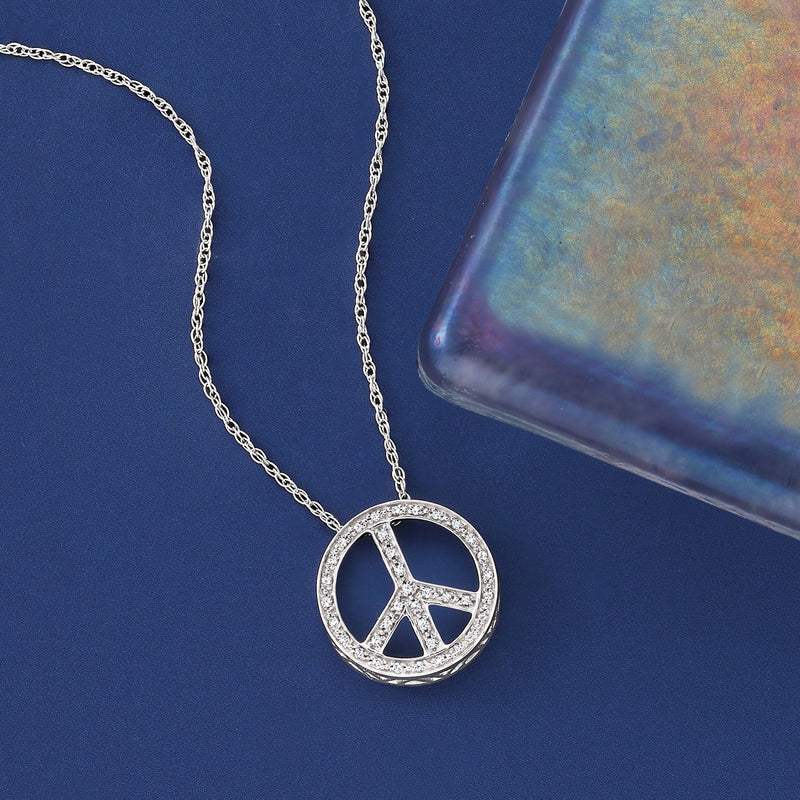 Sterling silver peace sign pendant necklace with round diamond halo on curb chain