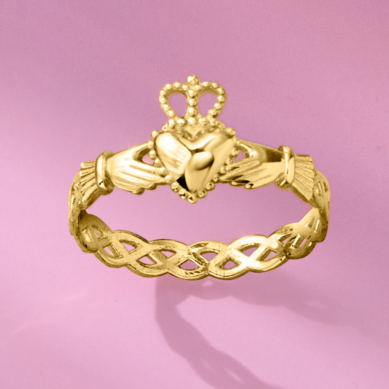 Yellow gold claddagh ring with crown top, heart center, clasped hands, and braided lattice band.