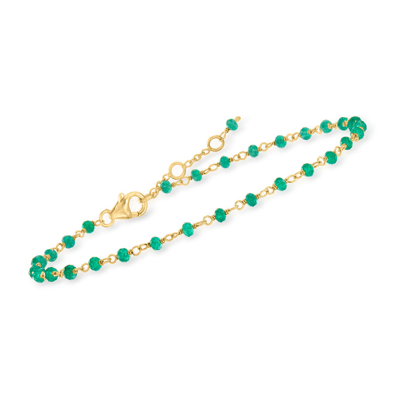 Gold-tone link anklet with small round green beads and clasp