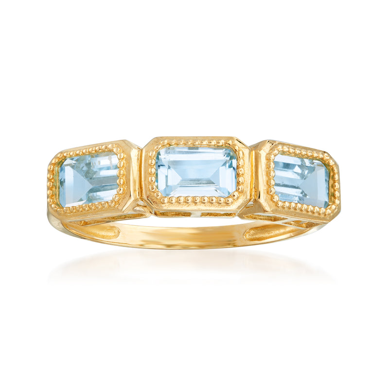 14k yellow gold three-stone sky blue topaz ring with three rectangular-cut stones
