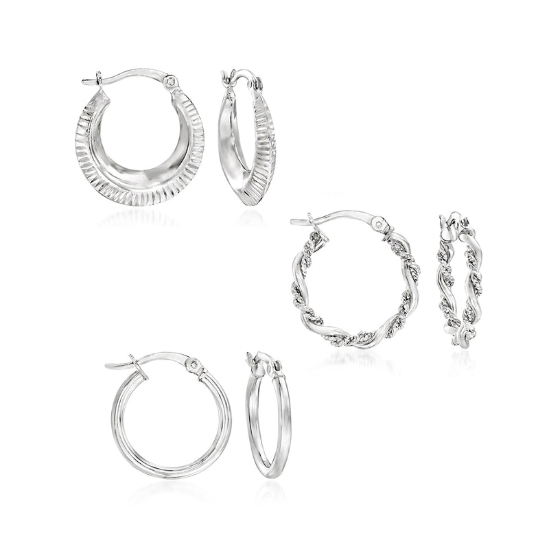 Sterling silver hoop earrings set with three pairs of textured hoops