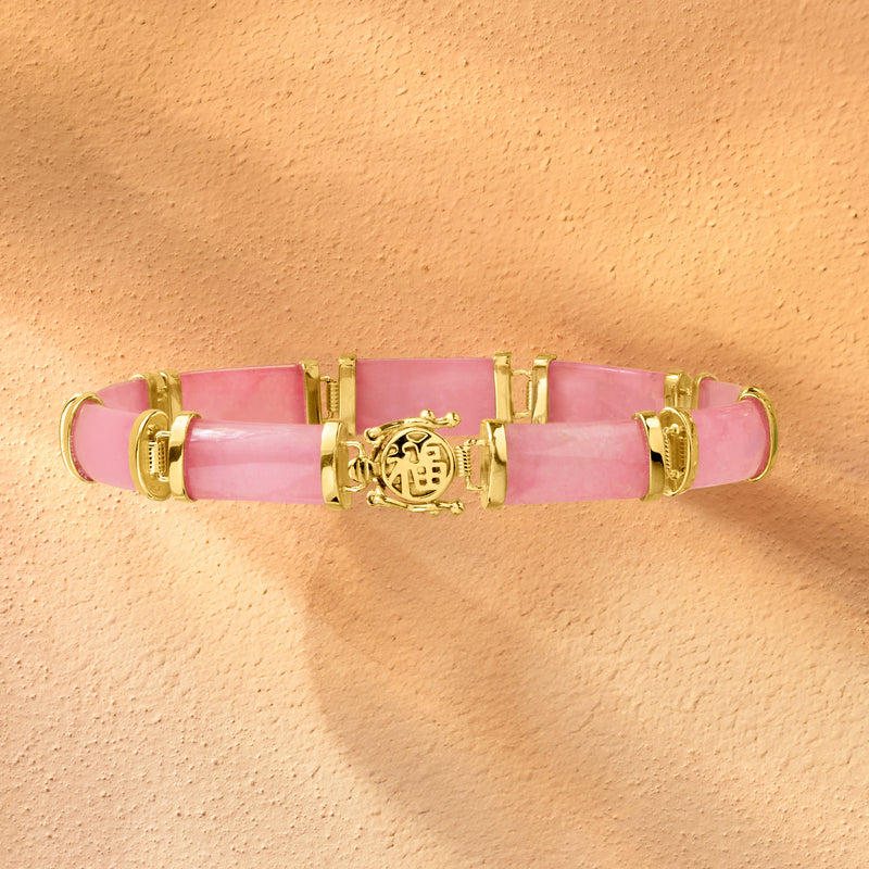 Pink jade bangle bracelet with gold over sterling centerpiece and side links