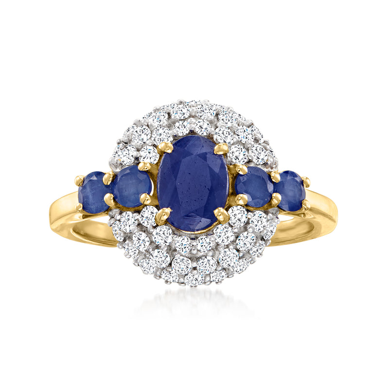 14kt yellow gold ring with oval blue sapphire center and white zircon halo