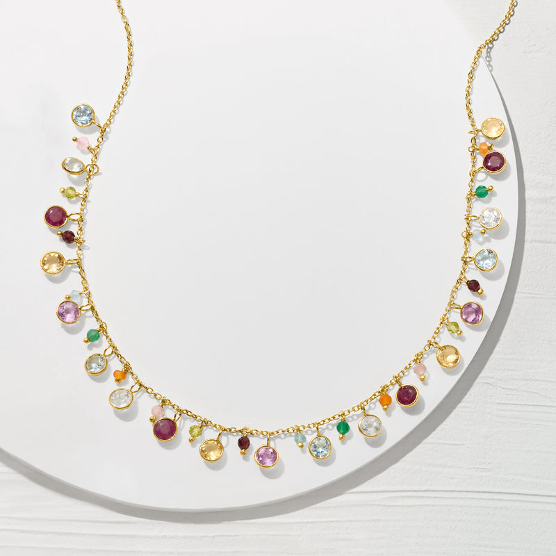 Gold over sterling multi-gemstone necklace with spaced round colored stones