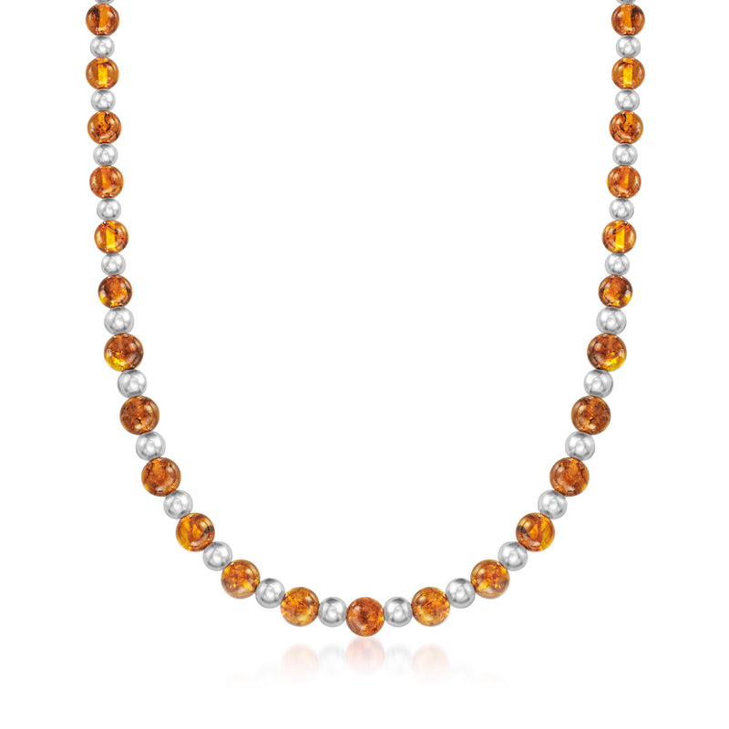 Amber bead necklace with sterling silver spacer beads and round orange beads