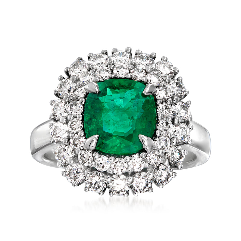 Emerald-cut green gemstone diamond halo ring in polished 18kt white gold