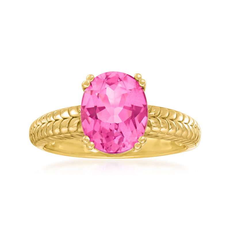 14kt yellow gold ring with oval pink topaz gemstone in prong setting