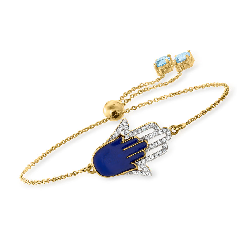 Gold-tone bolo bracelet with blue enamel hamsa hand charm and white crystal accents