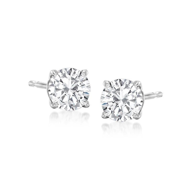 Platinum diamond stud earrings with round-cut center stones